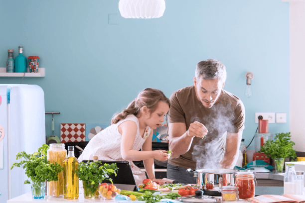 A person cooking meal at home A person cooking meal at home