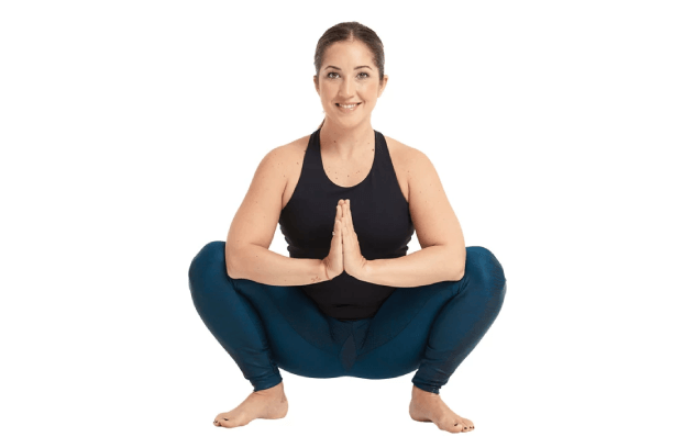 Squat and hold your hands together for Squat Prayer