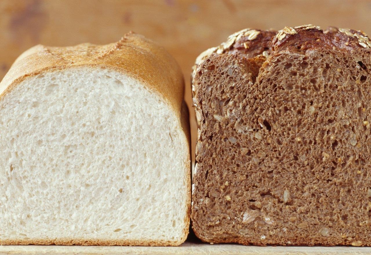 White bread and brown bread --- Image by © Royalty-Free/Corbis